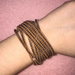 Faux suede wrap bracelet w/ lots of rhines…